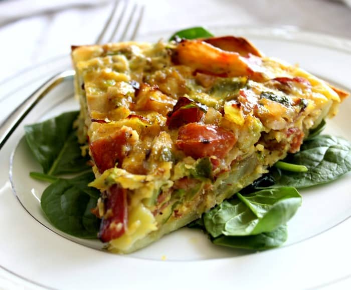 Sweet Potato Crusted Quiche with bacon, brussels, and sausage