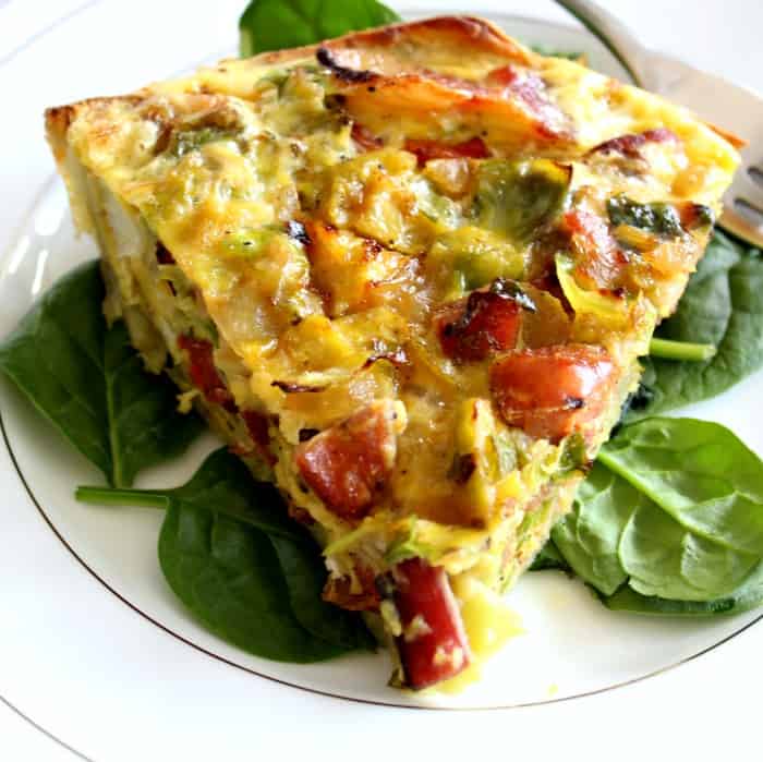 Sweet Potato Crusted Quiche with bacon, brussels, sausage