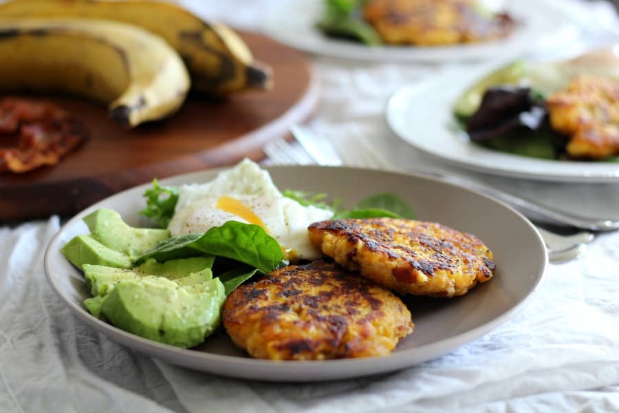 Plantain bacon fritters with avocado and poached egg