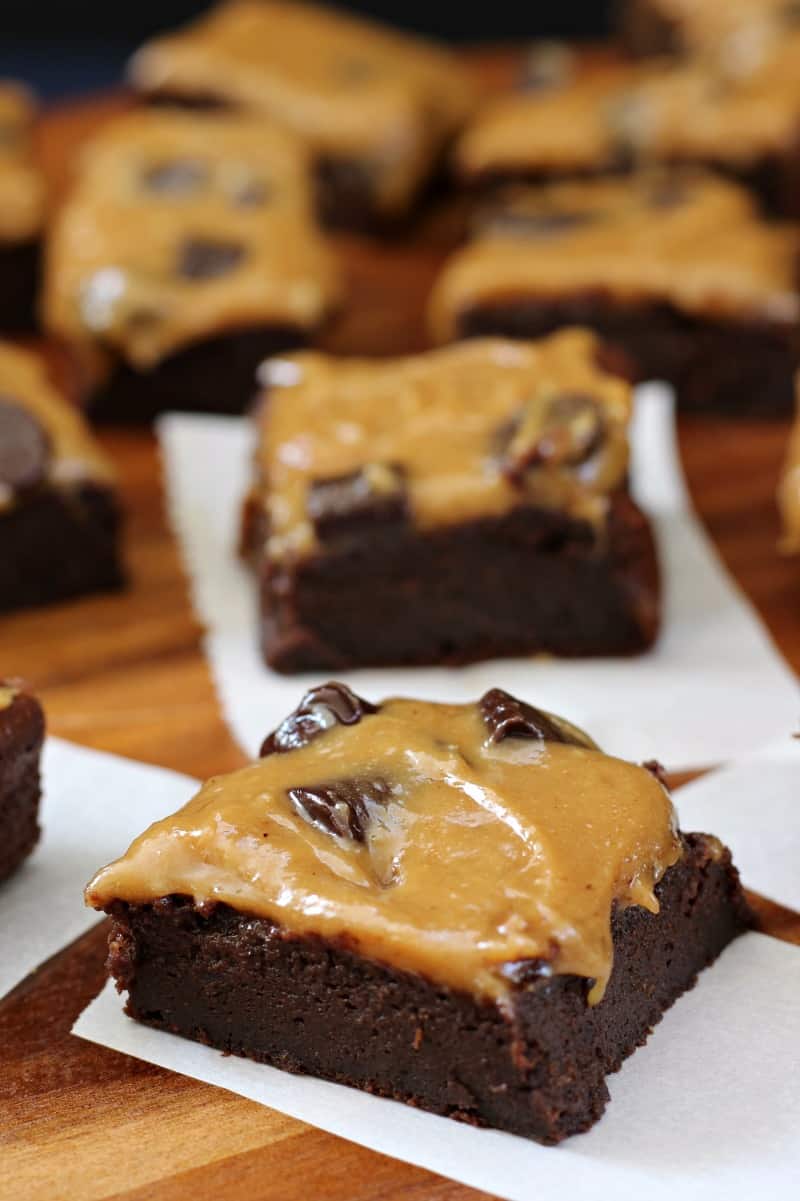 Flourless paleo fudge brownies with chocolate chunk caramel frosting