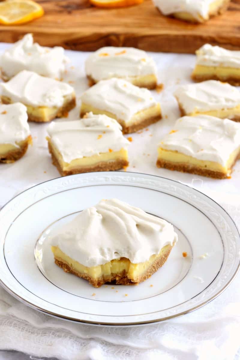 Triple layer paleo lemon bars with coconut whipped cream