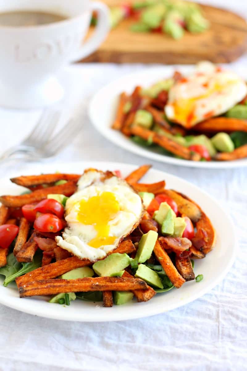 smothered breakfast sweet potato fries with eggs and avocado