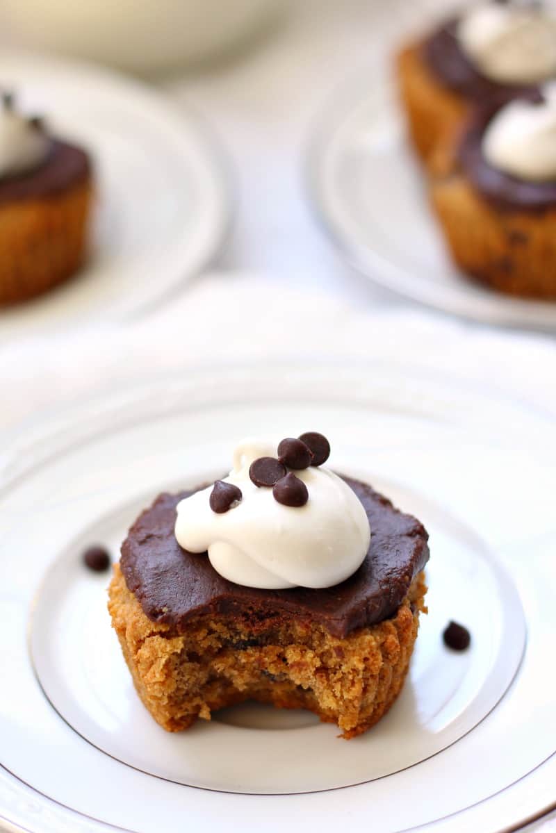 Chocolate chip cookie cupcake with coconut whipped cream and chocolate fudge