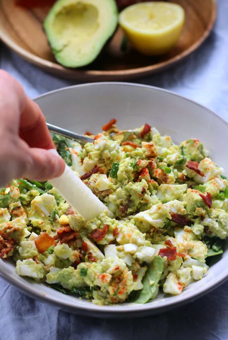 deviled avocado egg salad that's mayo free with bacon and chives. Paleo, whole30 friendly and soy free