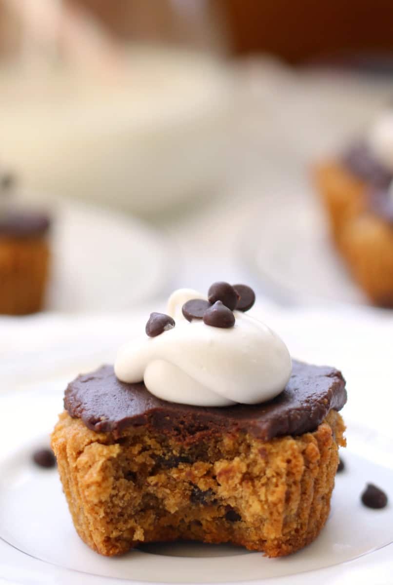 chocolate chip cookie cupcakes with chocolate fudge and coconut whipped cream