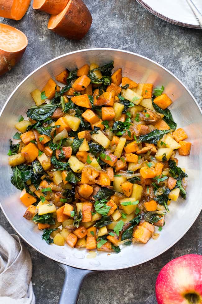 closeup view of hash with kale, sweet potatoes, and apples