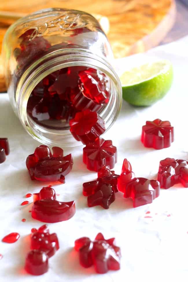 This Tart Cherry Lime Homemade Gummy "Candy" is made with grass fed, pasture raised gelatin for a boost of immunity and gut healing powers!  This healthy homemade gummy candy is ultra kid friendly and great for grown-ups too.   Made with 100% tart cherry juice, raw honey and grass fed gelatin.