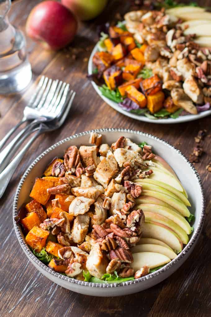 two butternut squash and chicken salads with apples and pecans