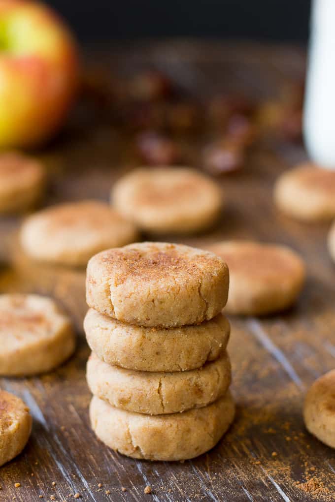 a stack of four no bake apple cinnamon cookies on a board