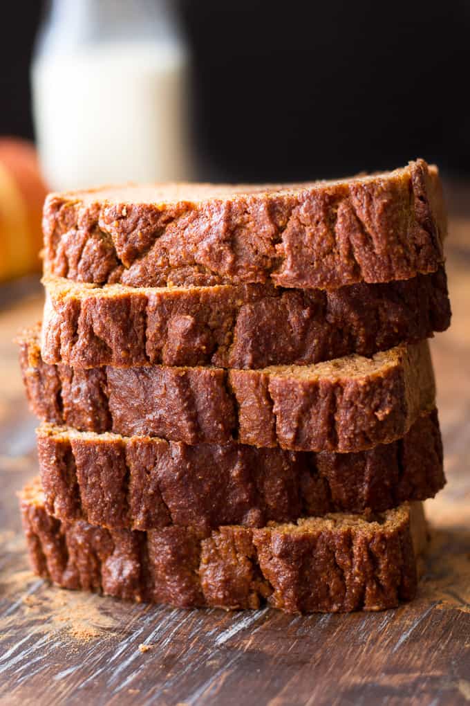 a stack of five thick Paleo pumpkin bread slices 