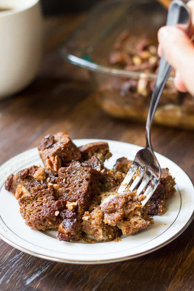 a fork piercing a piece of baked paleo pumpkin french toast