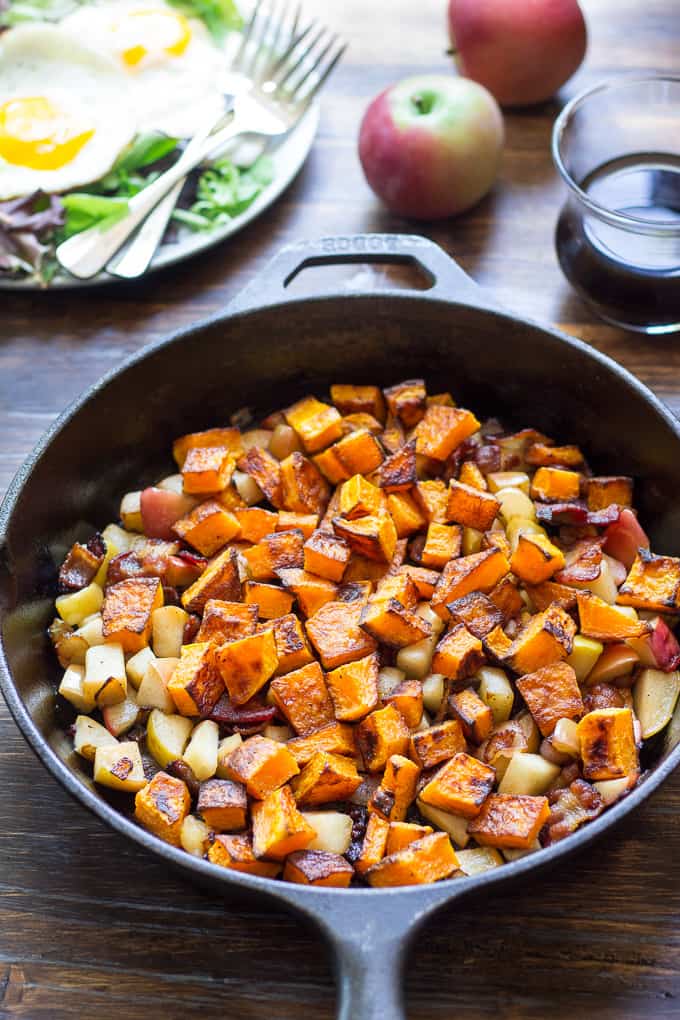 butternut squash hash with bacon and apples in a cast iron skillet