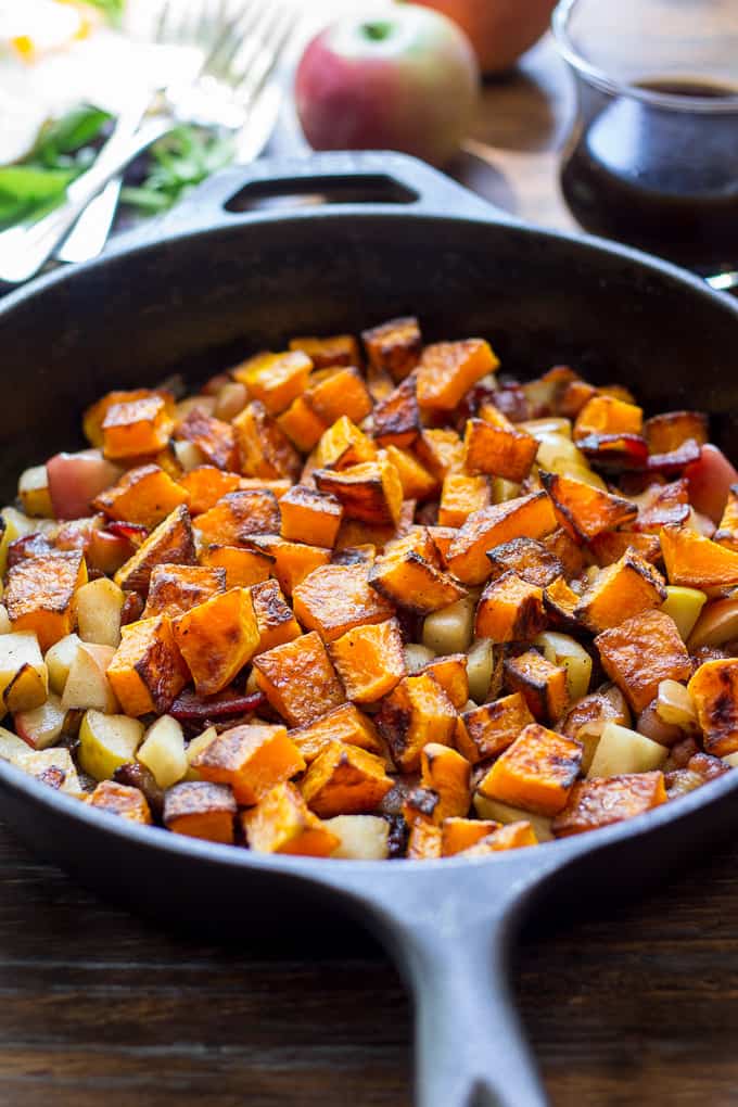 closeup photo of butternut squash and apple hash in a skillet