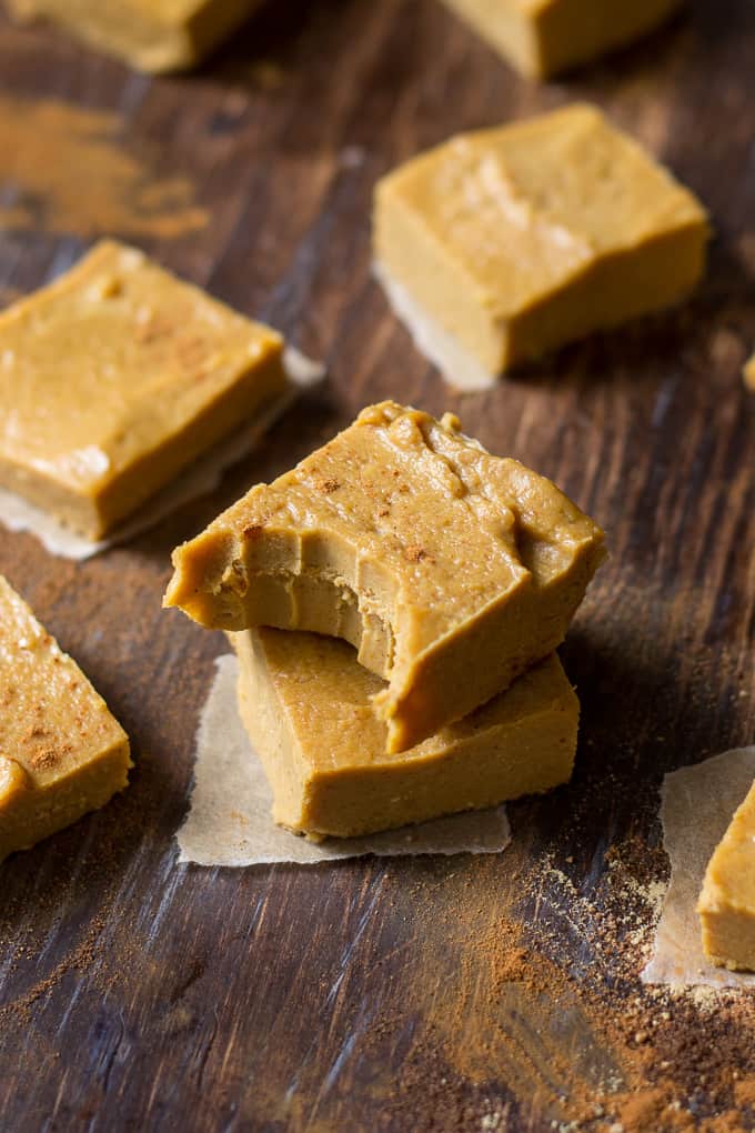 squares of pumpkin fudge and cinnamon on a wooden board 