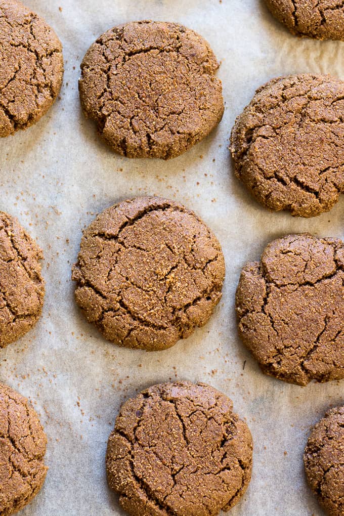 Big soft and chewy Paleo ginger cookies that no one will believe are Paleo! Perfect as a Christmas cookie, for cookie exchanges or as an anytime dessert. Grain free, gluten free, dairy free.