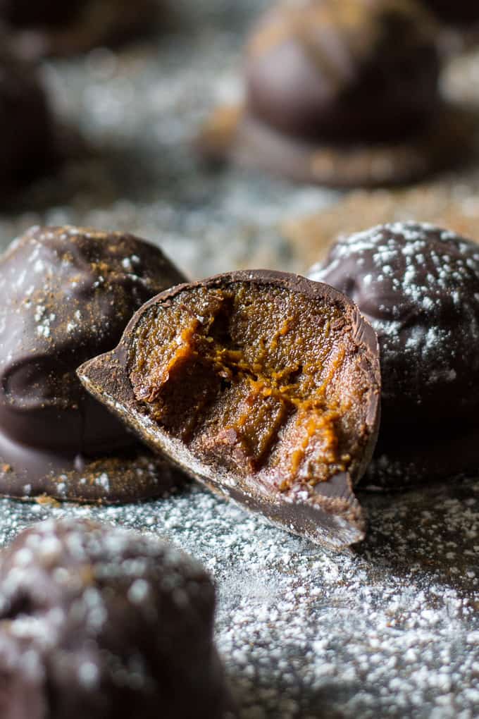 Healthy gingerbread chocolate truffles that are Paleo, vegan, refined sugar free but test rich, gooey, and perfectly sweet! They make a great healthy holiday dessert that no one will guess is Paleo!