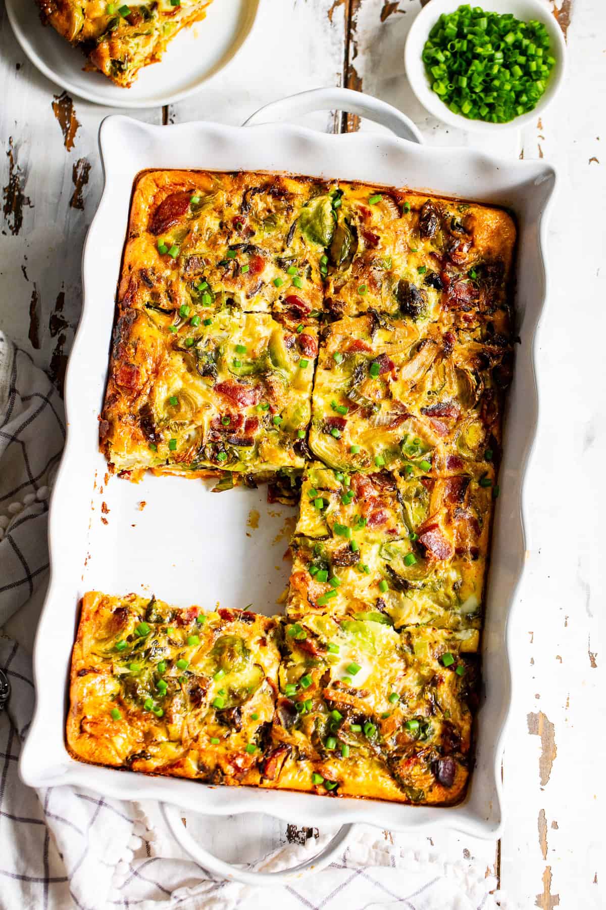 Overhead view of Paleo breakfast casserole with bacon, Brussels sprouts and sweet potatoes