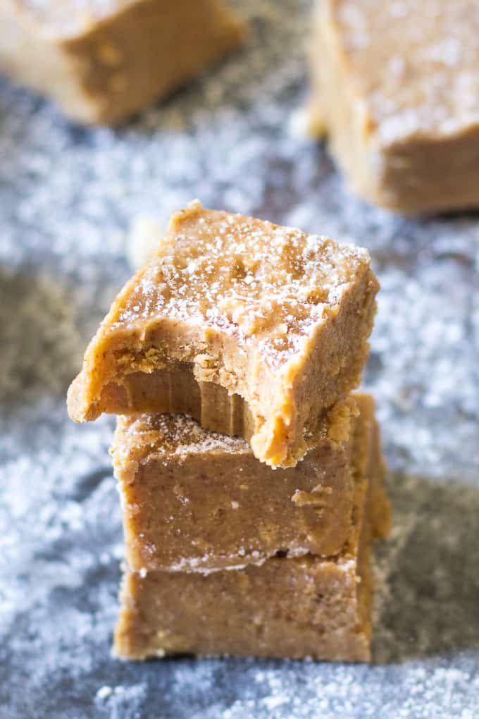 This creamy, rich and sweet Vanilla Sugar Cookie Dough Fudge is secretly healthy for you but you'd never guess! Paleo and vegan sugar cookie dough is swirled through vanilla fudge, then chilled to achieve the perfect texture. Great for the holidays or anytime!