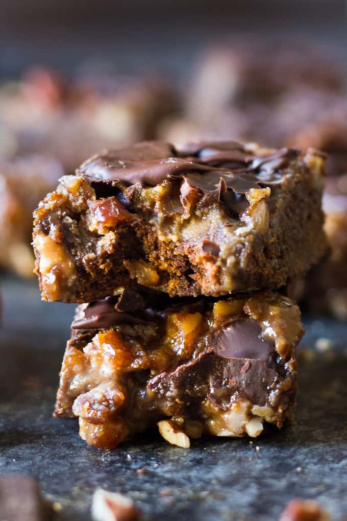 Turtle Bars with a chewy chocolate cookie layer, gooey caramel pecan layer and creamy chocolate shell! Gluten free, grain free, dairy free and makes a great holiday dessert!