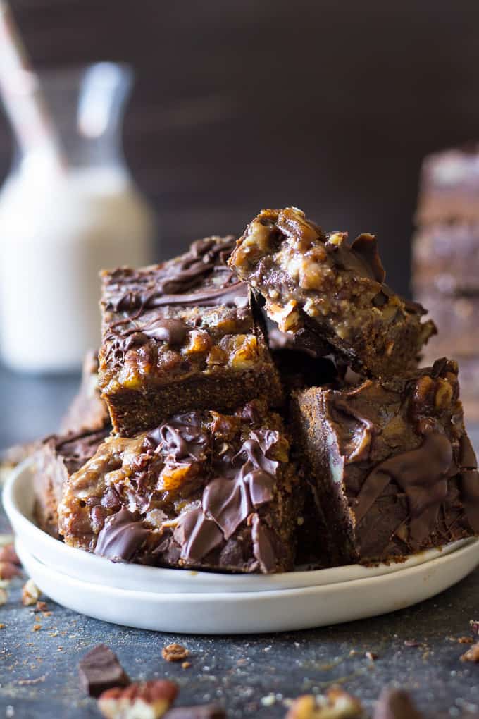 Turtle Bars with a chewy chocolate cookie layer, gooey caramel pecan layer and creamy chocolate shell! Gluten free, grain free, dairy free and makes a great holiday dessert!