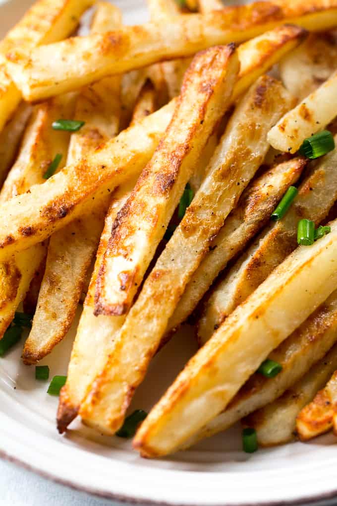 Easy to make crispy baked french fries with a spicy chipotle ranch dip that's Paleo and Whole30 compliant! Serve these baked french fries as a fun and healthy side dish, appetizer or snack.