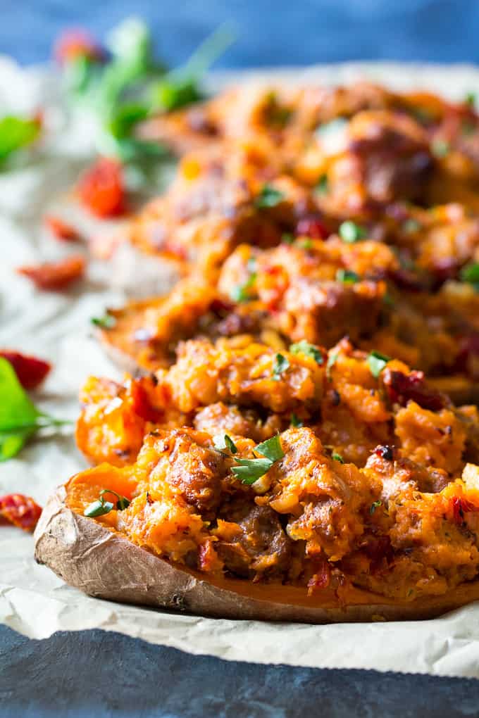 These are the ultimate Paleo and Whole30 Twice Baked Sweet Potatoes! With an addicting filling that tastes just like sausage pizza, they're a great weeknight dinner (do the first baking ahead of time), healthy, filling, and kid friendly.