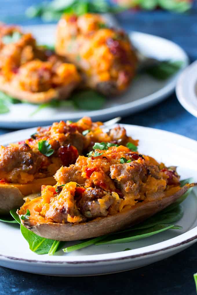 These are the ultimate Paleo and Whole30 Twice Baked Sweet Potatoes! With an addicting filling that tastes just like sausage pizza, they're a great weeknight dinner (do the first baking ahead of time), healthy, filling, and kid friendly.