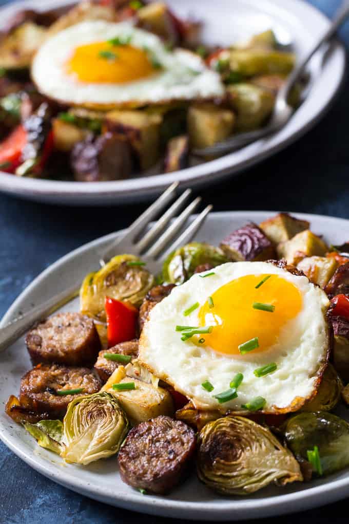 This Whole30 and paleo sausage sweet potato veggie skillet is easy to make, great for lunch, dinner or topped with fried eggs for breakfast!  