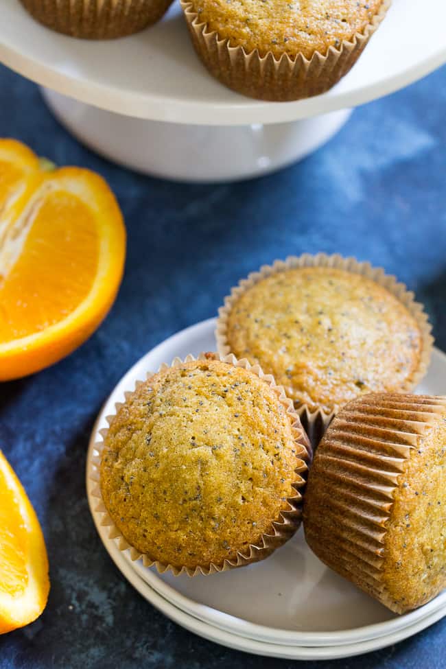 These orange almond poppy seed muffins are the perfect sweet addition to your breakfast and make great snacks too. Perfectly moist, sweet and packed with flavor and a hint of spice, you won't believe they're gluten free, dairy free, and paleo!