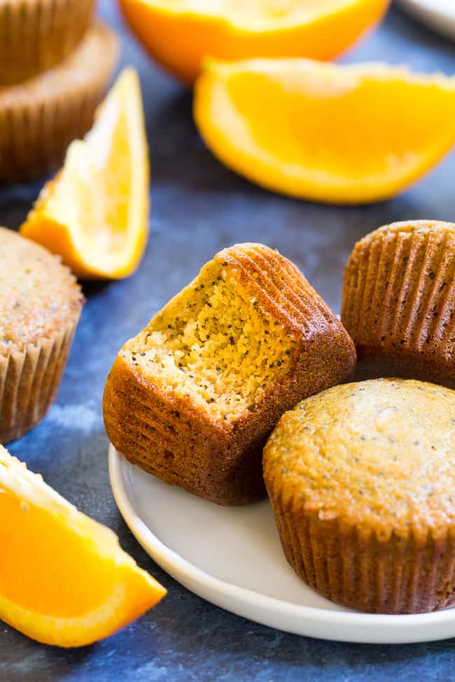 These orange almond poppy seed muffins are the perfect sweet addition to your breakfast and make great snacks too. Perfectly moist, sweet and packed with flavor and a hint of spice, you won't believe they're gluten free, dairy free, and paleo!