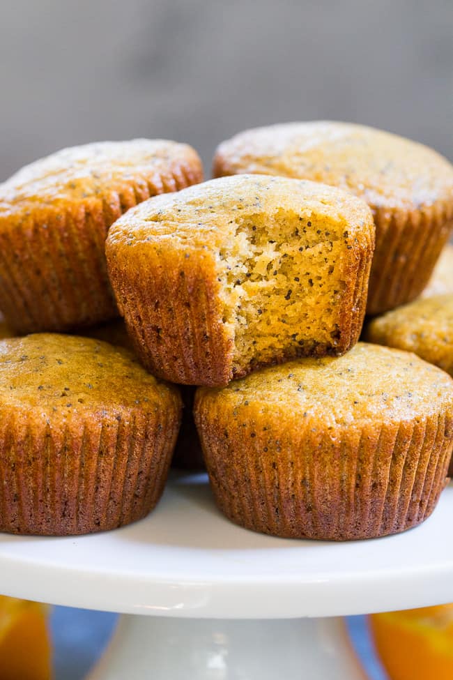 These orange almond poppy seed muffins are the perfect sweet addition to your breakfast and make great snacks too. Perfectly moist, sweet and packed with flavor and a hint of spice, you won't believe they're gluten free, dairy free, and paleo!