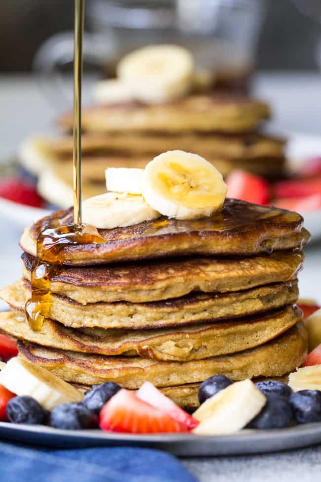 These Paleo banana coconut flour pancakes are so perfectly fluffy, moist and sweet that you won't believe they're grain free, dairy free, nut free and refined sugar free! Your family's paleo breakfast just got a delicious addition!