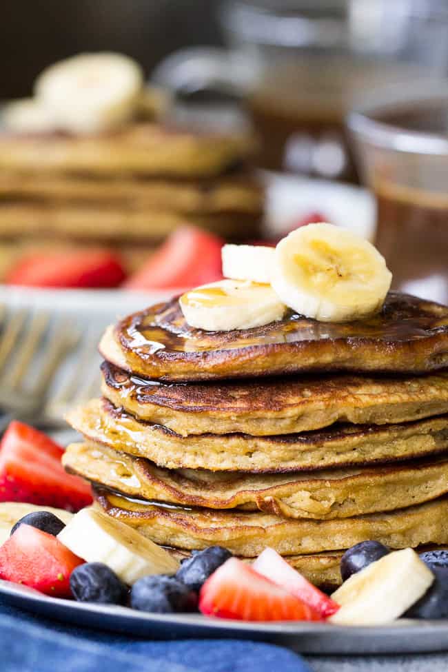 These Paleo banana coconut flour pancakes are so perfectly fluffy, moist and sweet that you won't believe they're grain free, dairy free, nut free and refined sugar free! Your family's paleo breakfast just got a delicious addition!