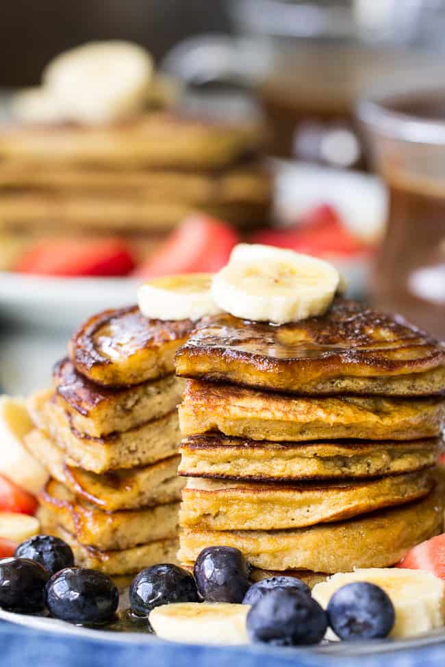 These Paleo banana coconut flour pancakes are so perfectly fluffy, moist and sweet that you won't believe they're grain free, dairy free, nut free and refined sugar free! Your family's paleo breakfast just got a delicious addition!