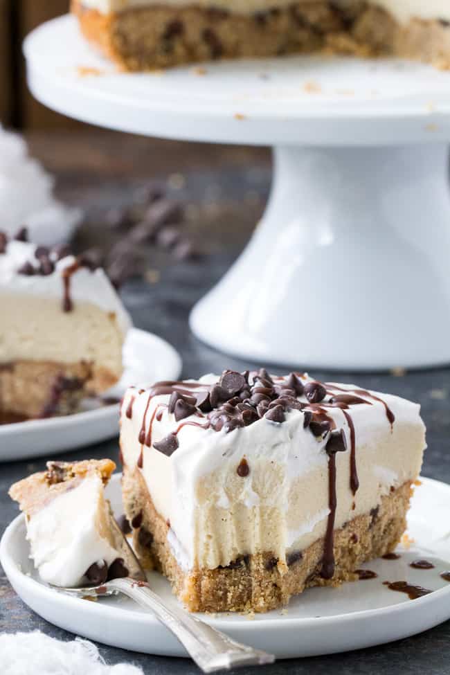 This chocolate chip cookie vanilla cheesecake starts with a thick vegan chocolate chip cookie layer topped with creamy cashew vanilla cheesecake, coconut whipped cream, more chocolate chips and a rich drizzle of chocolate. It's the perfect secretly healthy dessert for any special occasion, holiday, or simply because you want to treat yourself! Gluten free, dairy free, vegan, paleo.