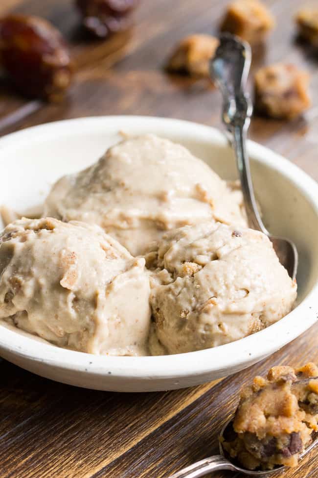 This no-churn chocolate chip cookie dough paleo & vegan ice cream is creamy and loaded with chewy cookie dough bites, yet secretly so healthy!  The ice cream base is sweetened with dates and bananas and comes together quickly in a blender.  The cookie dough takes two minutes to make and is grain free and dairy free.   It's a healthy and addicting frozen treat that you'll want to make again and again!