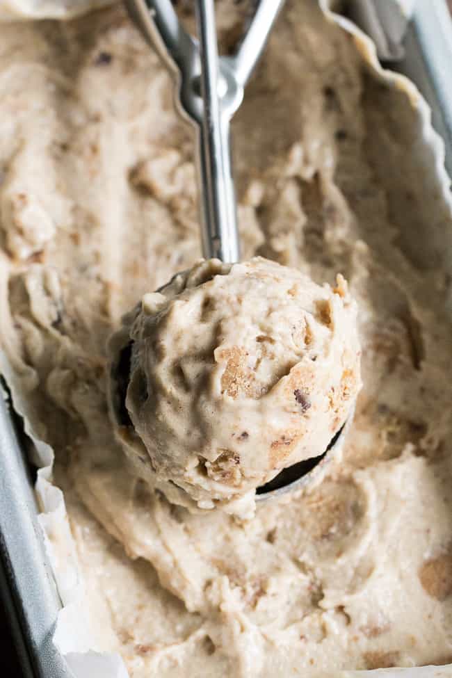 This no-churn chocolate chip cookie dough paleo & vegan ice cream is creamy and loaded with chewy cookie dough bites, yet secretly so healthy!  The ice cream base is sweetened with dates and bananas and comes together quickly in a blender.  The cookie dough takes two minutes to make and is grain free and dairy free.   It's a healthy and addicting frozen treat that you'll want to make again and again!