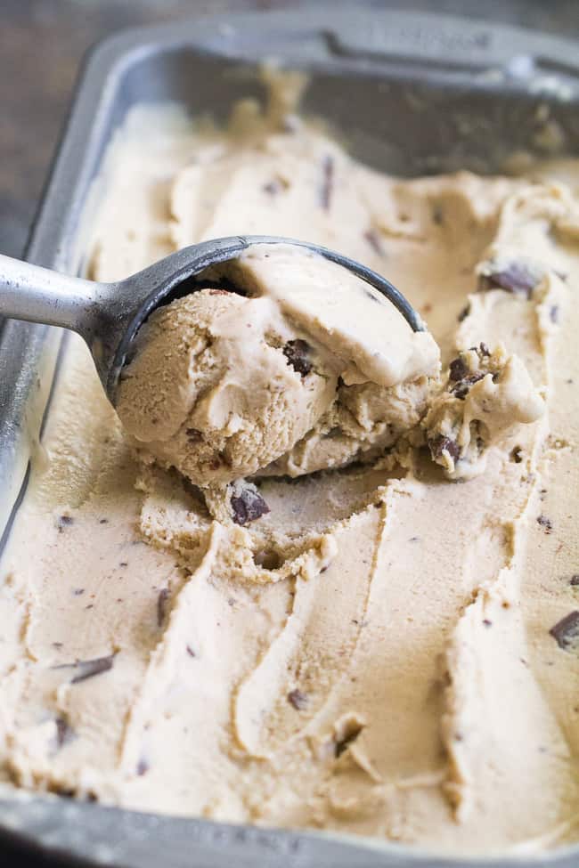 This easy dairy-free, paleo and vegan espresso chocolate chip ice cream has the perfect balance of coffee flavor and dark chocolate chips.  The ingredients are quickly blended and then churned for a rich, creamy and healthy ice cream!