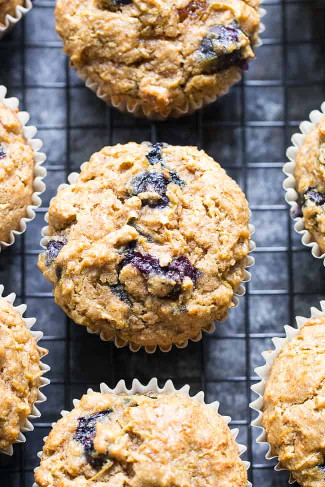 Tender, moist and hearty grain free and paleo blueberry zucchini muffins that everyone will love! The right combination of grain free flours gives them classic texture and unrefined coconut sugar adds the right amount of sweetness. Gluten free, dairy free, kid approved and great for breakfasts, brunches and snacks.