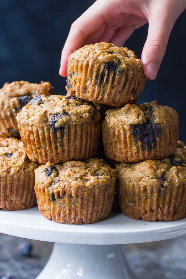 Tender, moist and hearty grain free and paleo blueberry zucchini muffins that everyone will love! The right combination of grain free flours gives them classic texture and unrefined coconut sugar adds the right amount of sweetness. Gluten free, dairy free, kid approved and great for breakfasts, brunches and snacks.