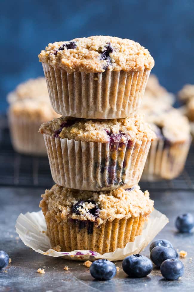 These Paleo Blueberry Muffins have classic flavor and texture plus the perfect crumb top - it's downright addicting!   Have one freshly baked or make them ahead of time and enjoy as a part of your breakfast or a grab-n-go snack.  They're grain free, dairy free, gluten-free and refined sugar free.