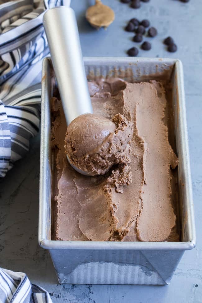 This no-churn chocolate coconut milk ice cream is so rich and creamy that you'd never guess it's vegan and paleo!  Almond butter adds creaminess to the texture and raw cacao plus pure maple syrup give this coconut milk ice cream a rich dark chocolate flavor.  Dairy-free, soy free, refined-sugar-free, easy to make!