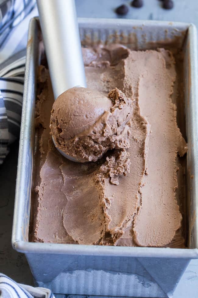 This no-churn chocolate coconut milk ice cream is so rich and creamy that you'd never guess it's vegan and paleo!  Almond butter adds creaminess to the texture and raw cacao plus pure maple syrup give this coconut milk ice cream a rich dark chocolate flavor.  Dairy-free, soy free, refined-sugar-free, easy to make!