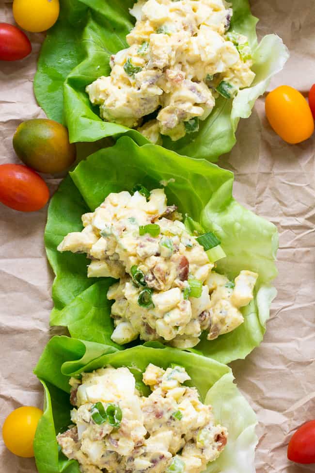 This super simple, classic paleo egg salad will become a new favorite for your whole family!  Prepared with sugar-free bacon and 1-minute homemade mayo, this egg salad is Whole30 compliant, low carb, and delicious over a green salad or in lettuce wraps!  Perfect to make ahead for weekday lunches. 