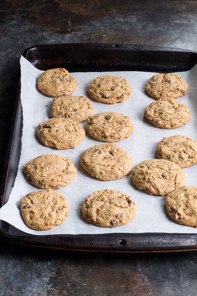 These paleo "oatmeal" raisin cookies are chewy, sweet and perfectly spiced and taste just like traditional oatmeal cookies, yet are completely grain free, vegan and paleo.   You'll fool everyone into thinking they're the real thing!