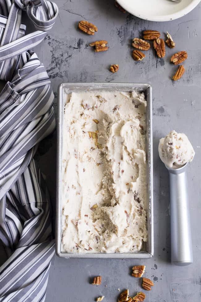 This "butter" pecan vegan ice cream is thick, creamy and decadently sweet yet made with no refined sugar or dairy. You won't believe you're not eating the real thing once you taste it!  Paleo, vegan, gluten free, dairy-free.