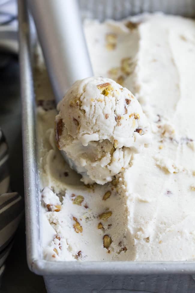 This "butter" pecan vegan ice cream is thick, creamy and decadently sweet yet made with no refined sugar or dairy. You won't believe you're not eating the real thing once you taste it!  Paleo, vegan, gluten free, dairy-free.