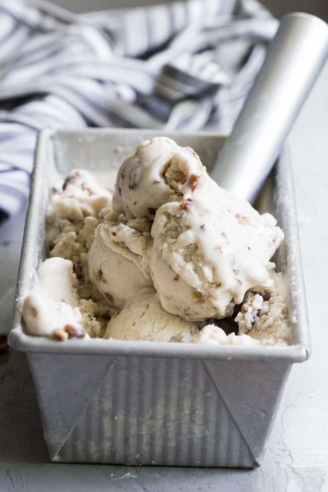 This "butter" pecan vegan ice cream is thick, creamy and decadently sweet yet made with no refined sugar or dairy. You won't believe you're not eating the real thing once you taste it!  Paleo, vegan, gluten free, dairy-free.