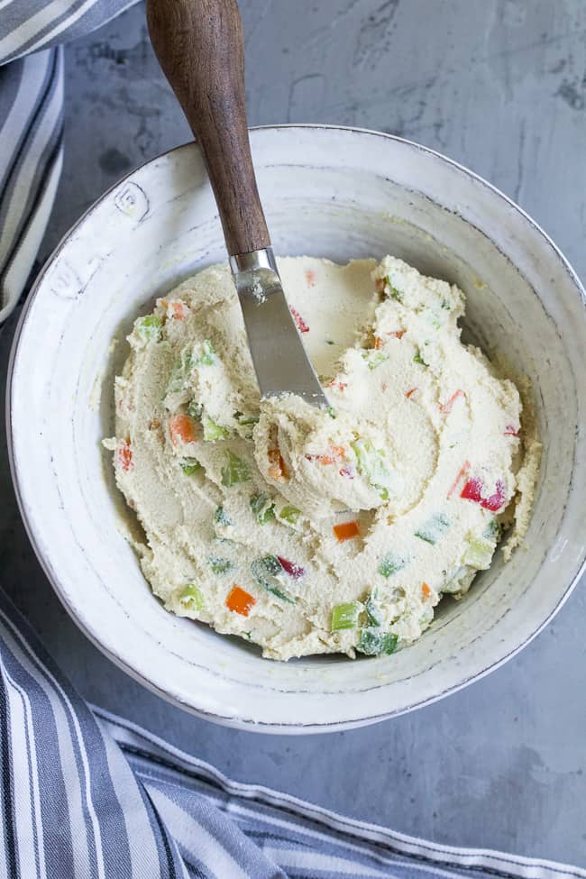This veggie packed cashew cream cheese tastes so much like the real thing that you won't believe it's not actually cheese!  It's made in minutes, great as a dip or spread, dairy free, vegan, paleo and Whole30.