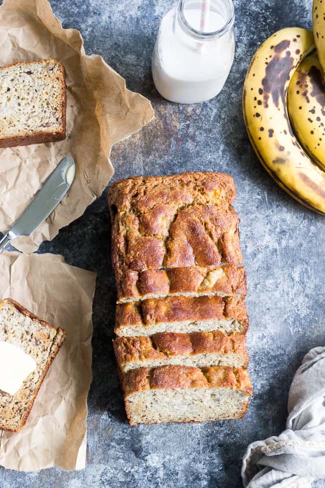 This deliciously hearty yet soft and moist Paleo banana bread is made with no grains, dairy, and no added sugar.  It's gluten free, Paleo and sweetened only with bananas and perfect for breakfast or a snack with your favorite spread.  Kid approved and easy to make!